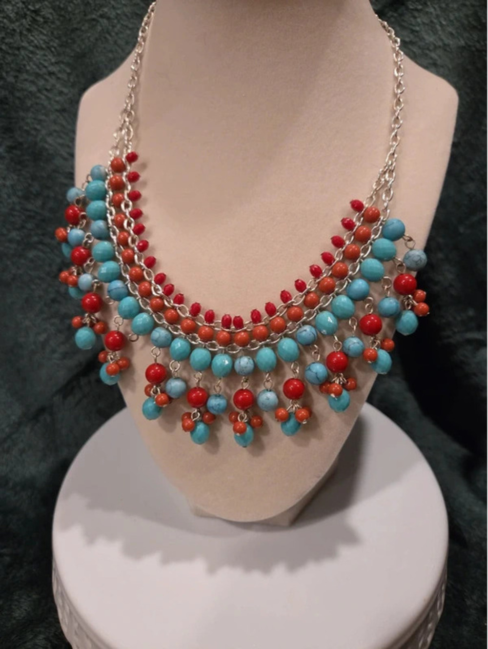 Red, turquoise, coral colored beaded necklace